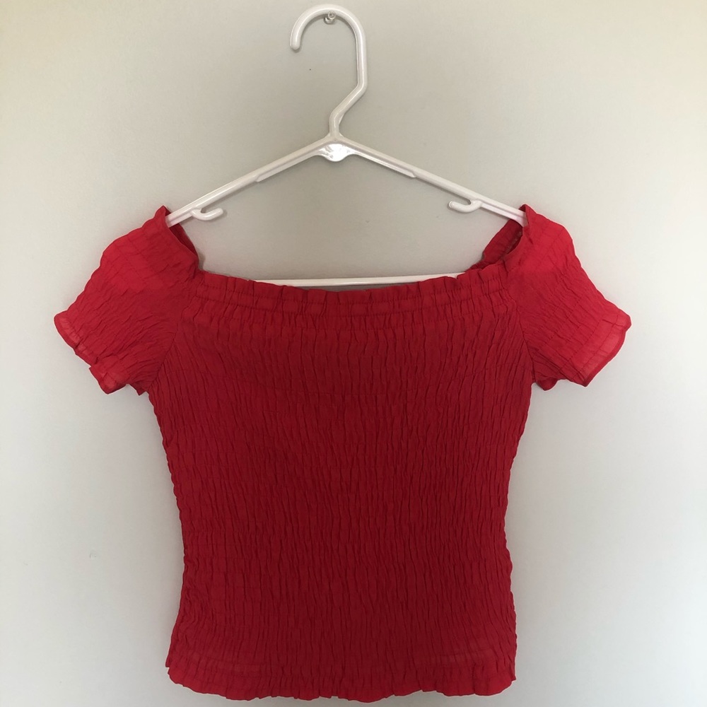 smocked red shirt